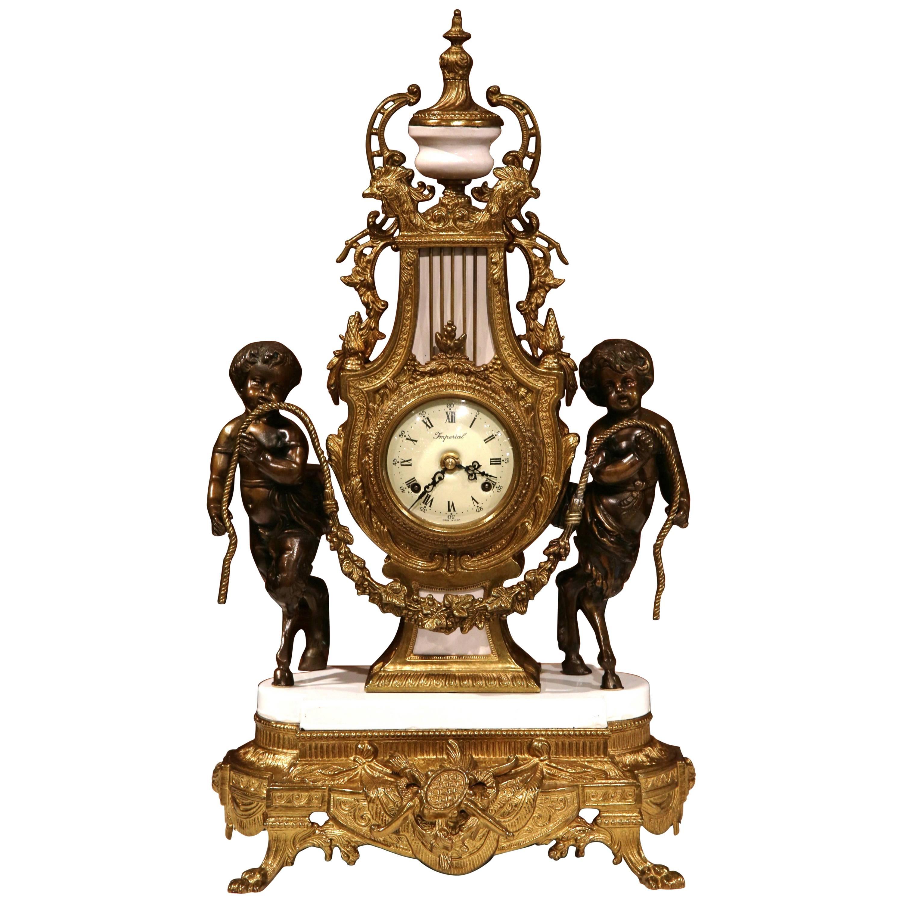 Early 20th Century Italian Carved Bronze and Marble Clock with Patinated Cherubs