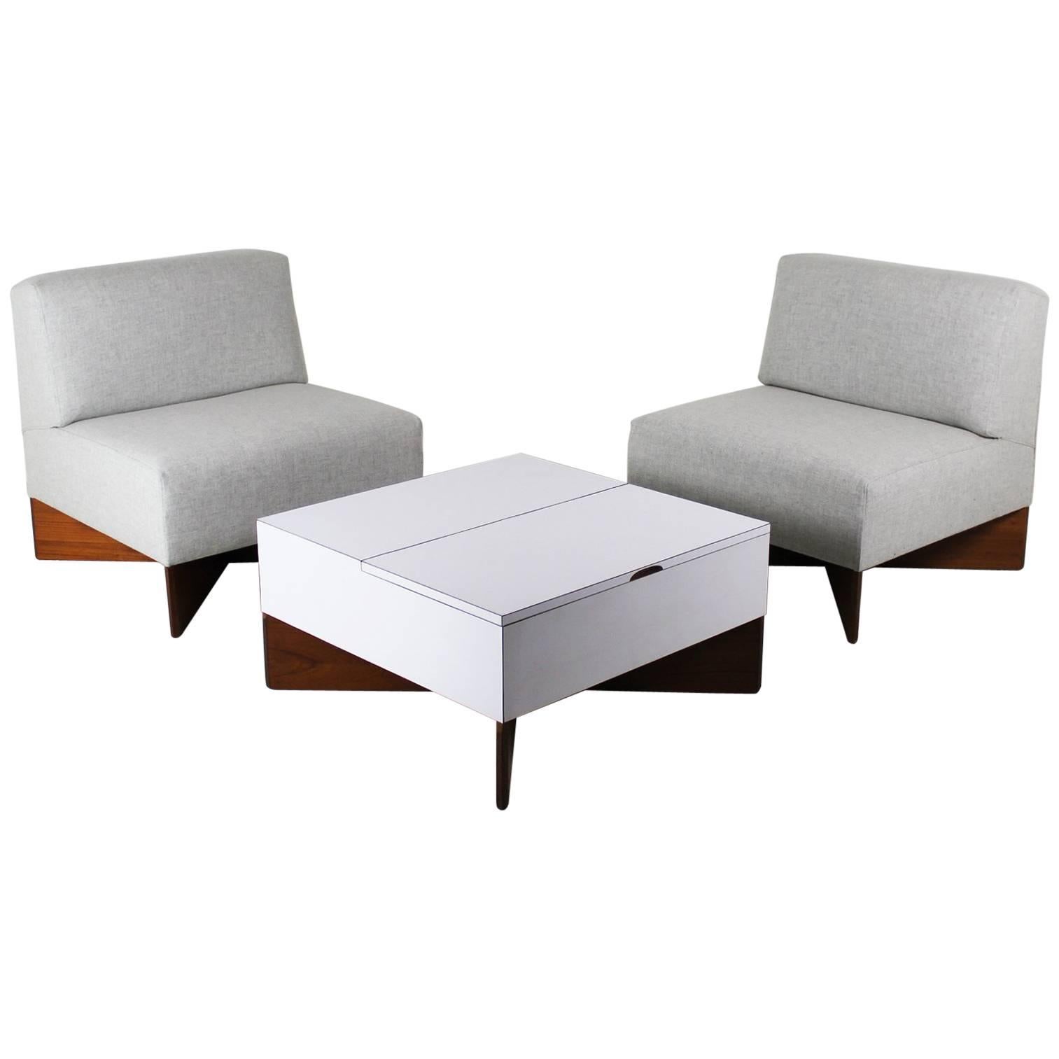 A Pair of Armchairs and a Coffee Table by Pierre Guariche for Huchers Minvielle For Sale