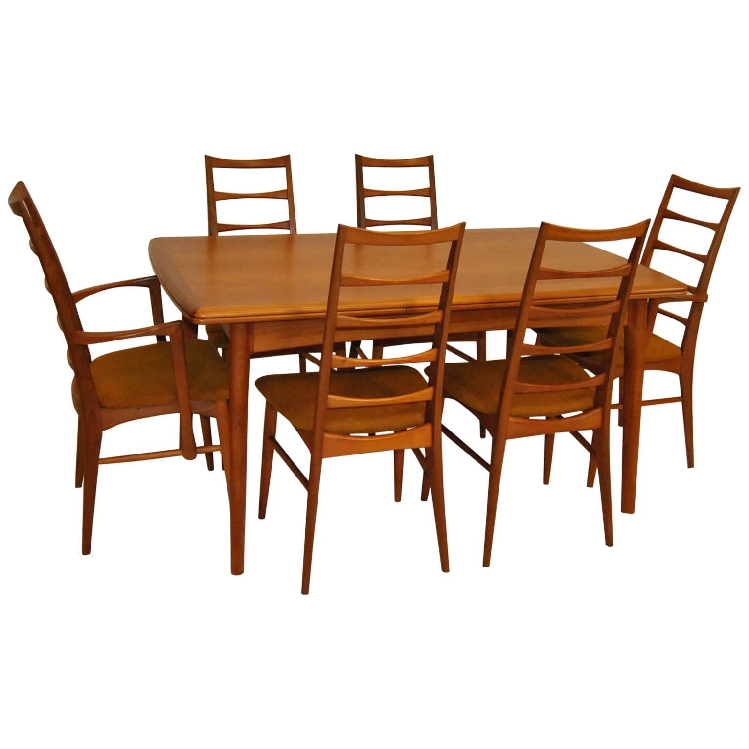 Danish Modern Teak Refractory Dining Table and Six "Liz" Hornslet Kofoed Chairs