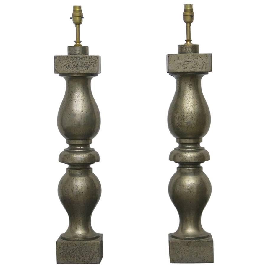 Pair of 19th Century Polished Iron Baluster Lamps For Sale