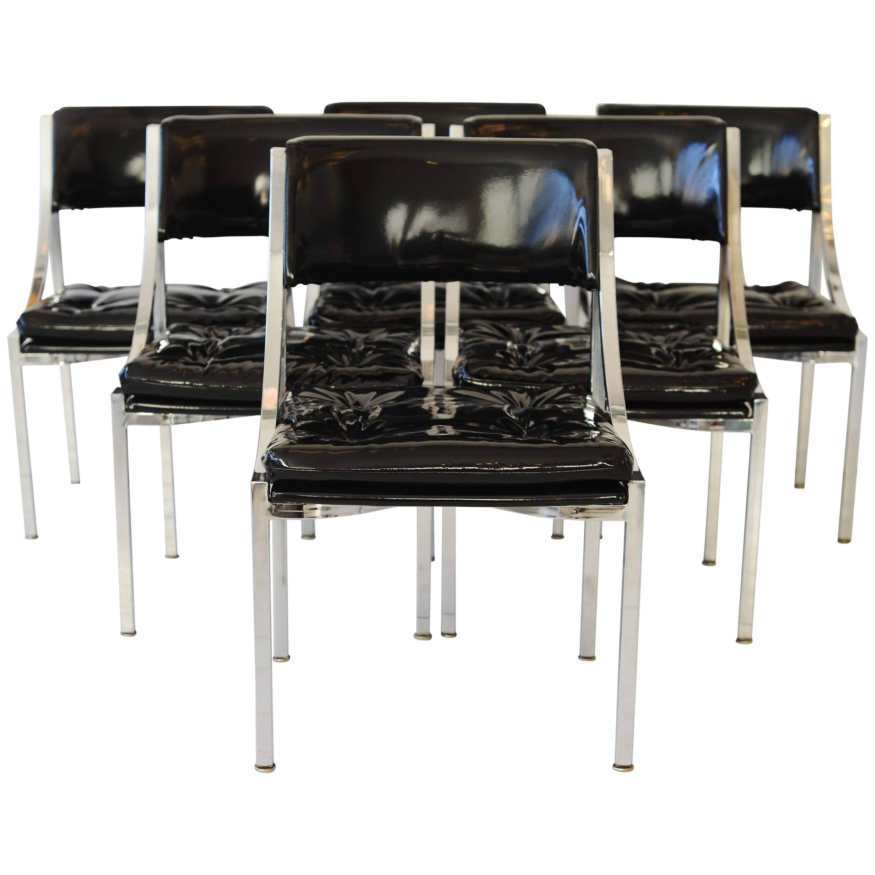 Set of Six Mid-Century Polished Chrome Chairs. Covered in black patent leather For Sale