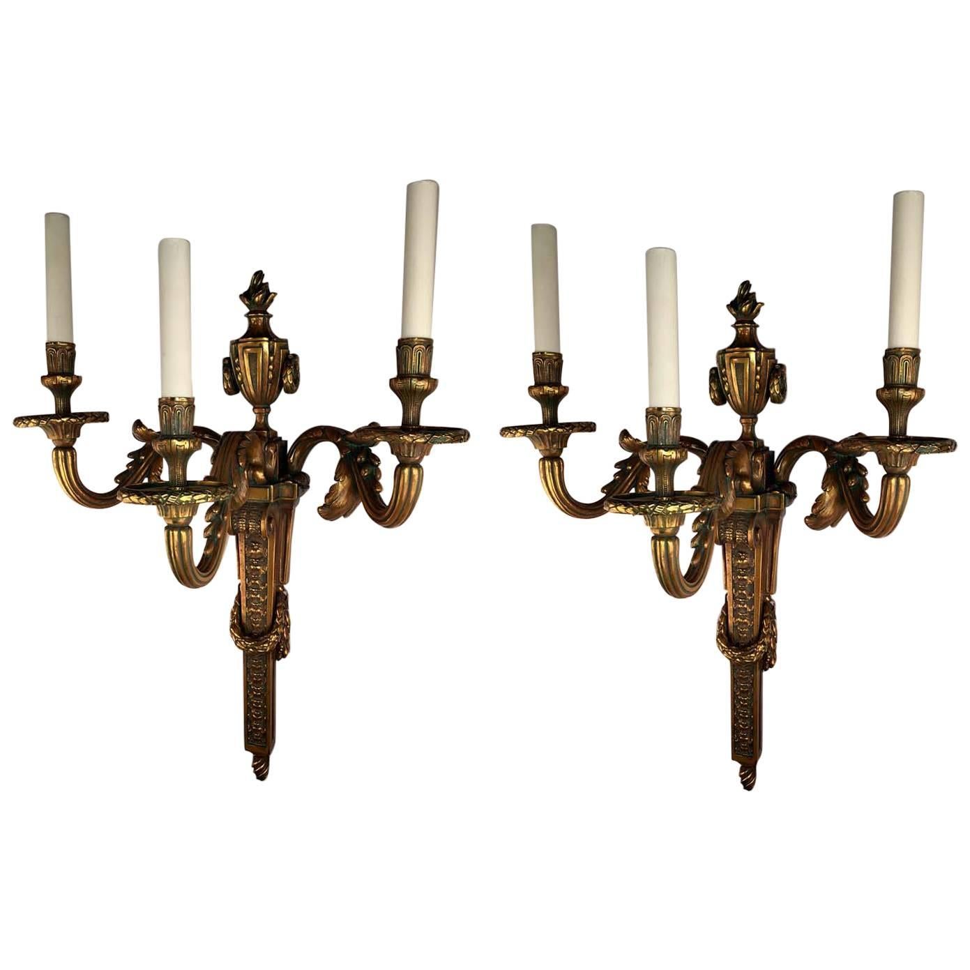 Pair of Louis XVI Style Three-Light Wall Sconces For Sale