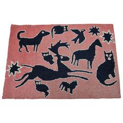 Hook Rug with Bold Black Animal Sihouettes