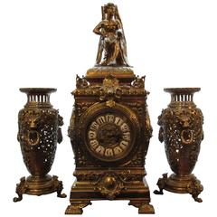 Large-Scale Clock Set, French Pierced Brass and Pair of Urns, circa 1890-1900