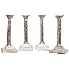 Set of Four English Silver Plated Candlesticks