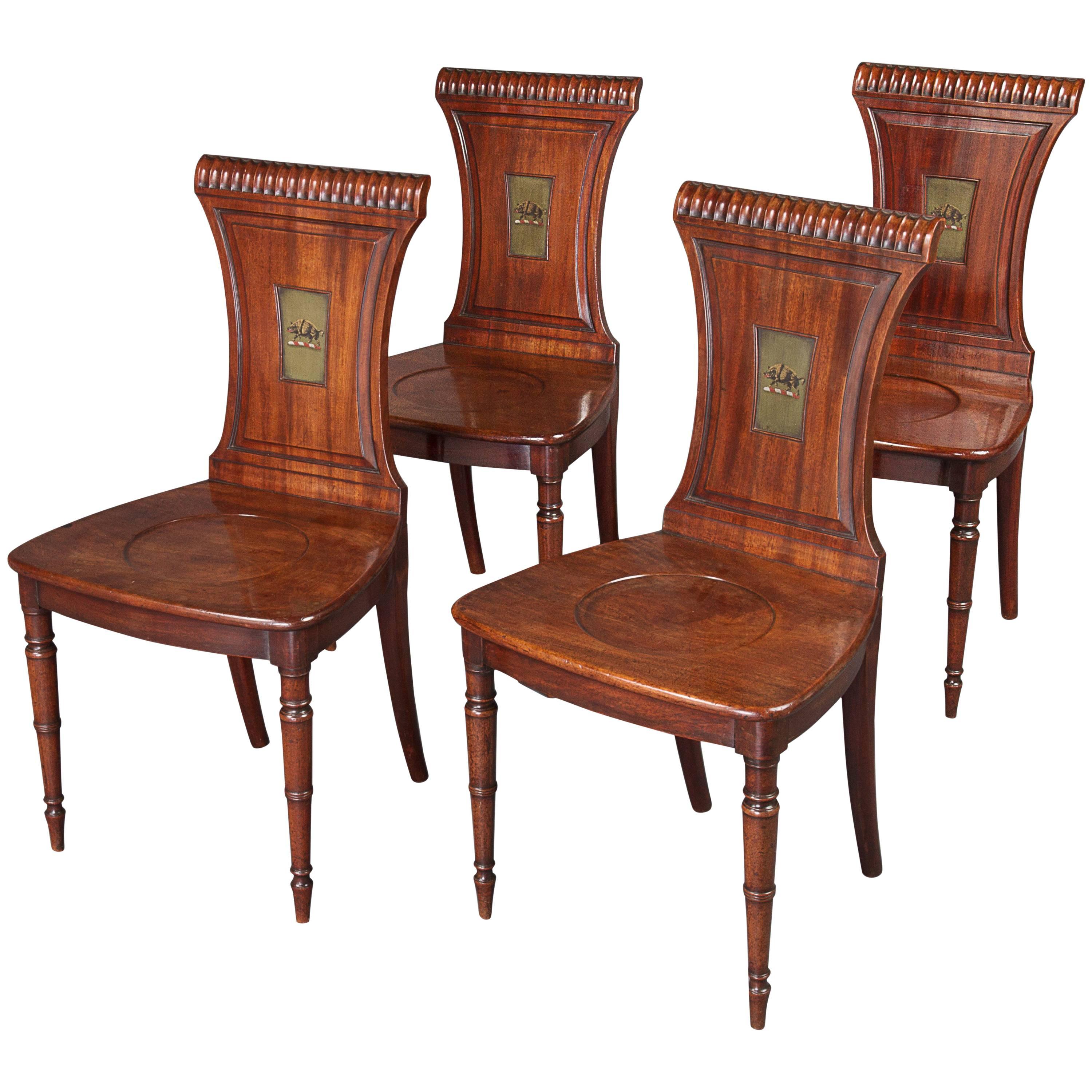 Fine Set of Four Regency Mahogany Armorial Hall Chairs For Sale at 1stDibs
