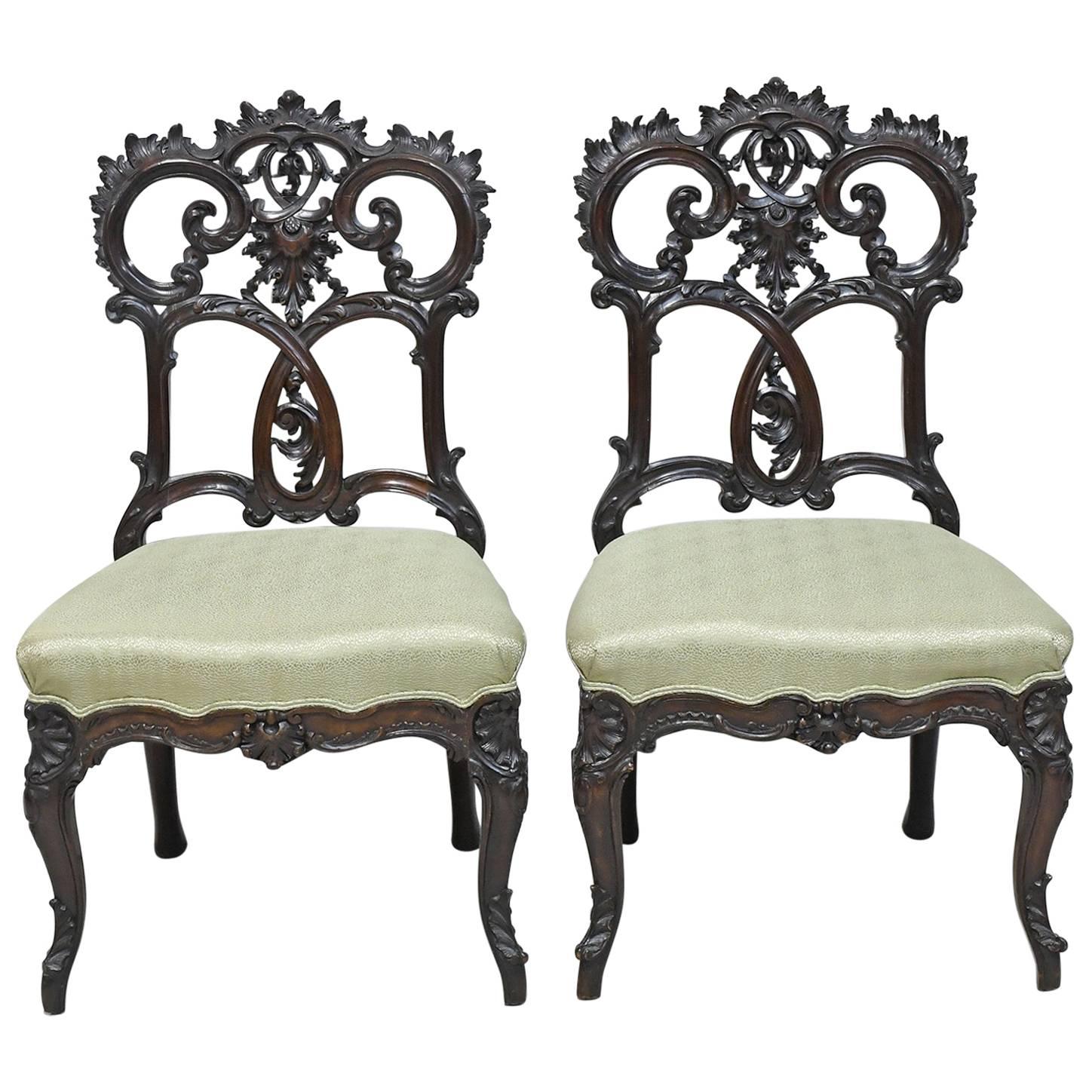 Pair of Antique American Carved Rococo Revival Chairs in Mahogany w/ Upholstery For Sale