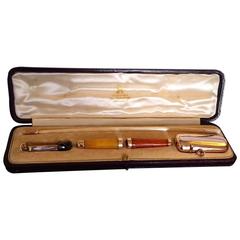 Antique Cased Asprey Amber and Gold Smoker's Set with Cigar Cutter and Vesta Case