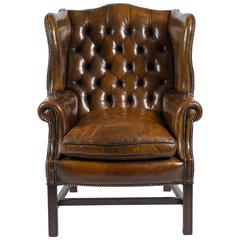 Antique Early 20th Century Leather Buttoned Back Wing Chair