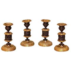 Set of Four Regency Period Bronze and Ormolu Candlesticks 2