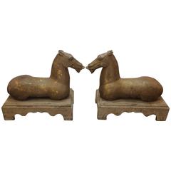 Striking Pair of Gilded Reclining Horses on Stands