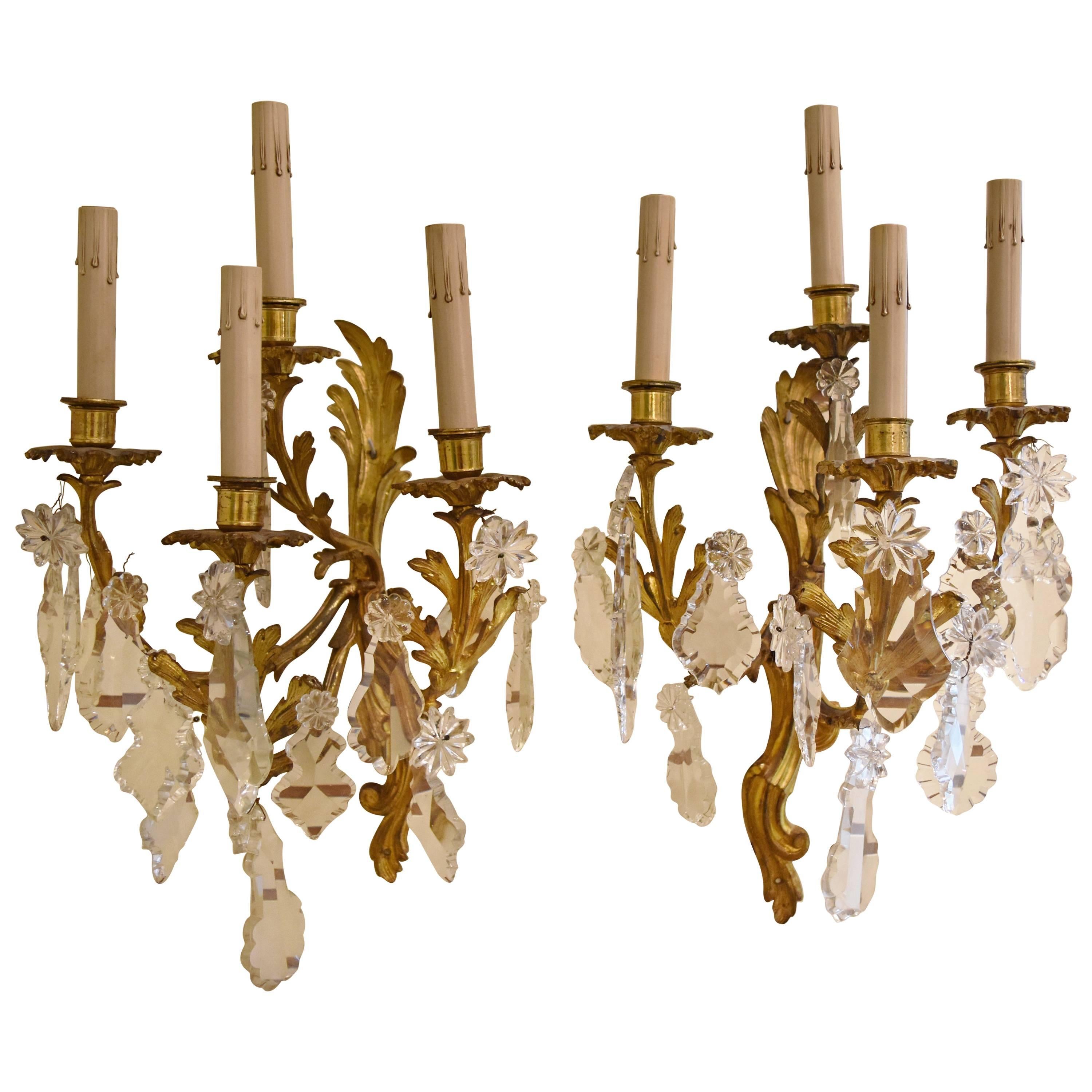 Pair of French Bronze and Crystal Sconces