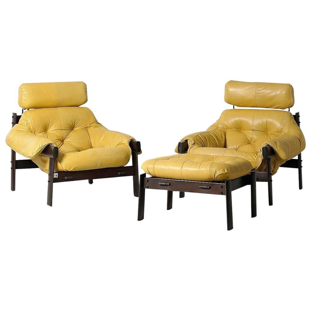 Pair of Percival Lafer Leather Armchairs and a Footstool, 1960s