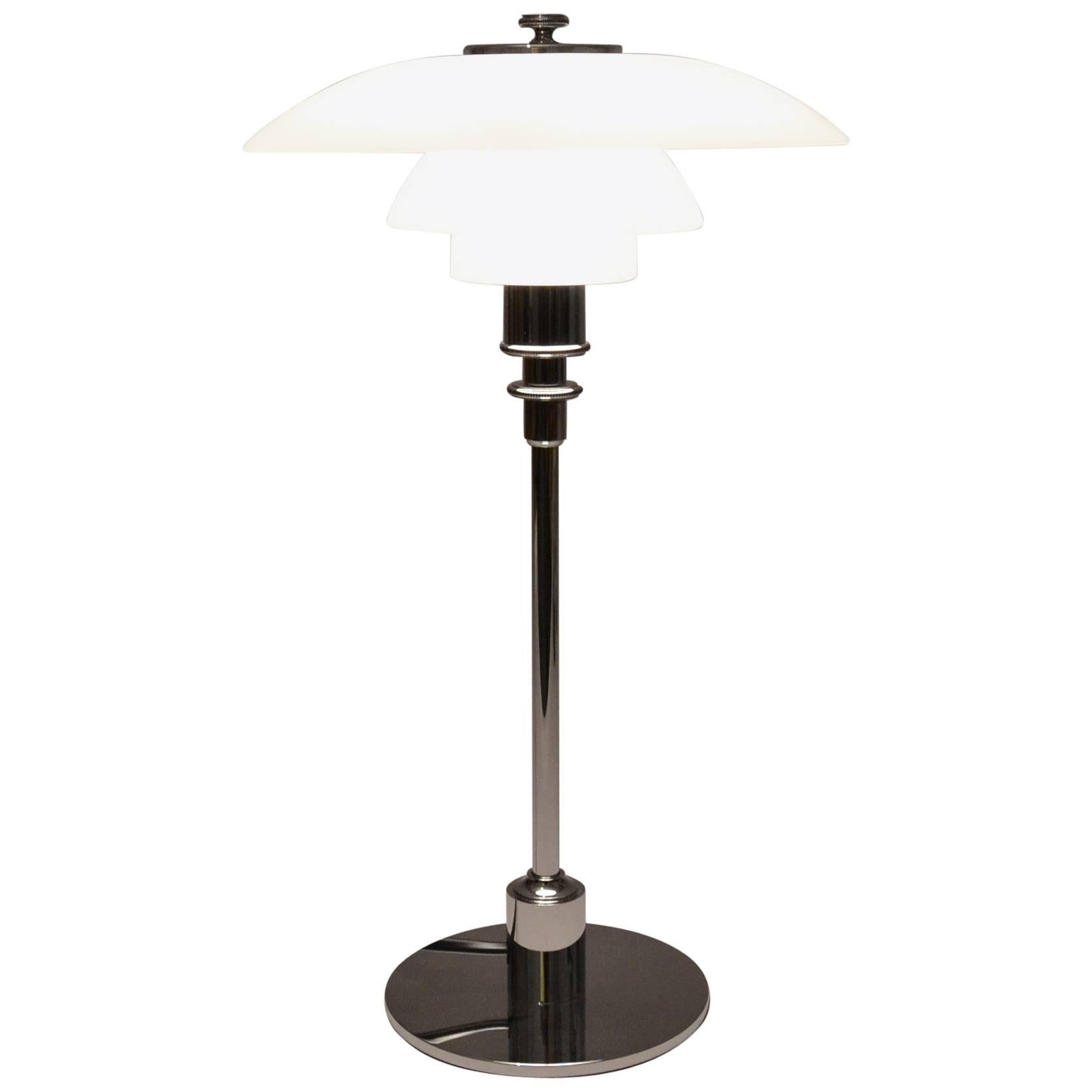 Designed by Poul Henningsen, circa 1927, produced by Louis Poulsen stainless steel with opaline glass.