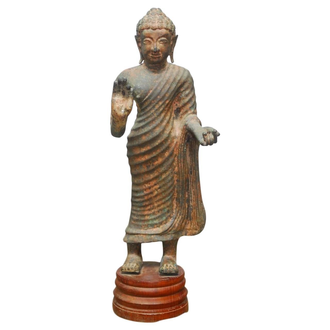 Cast Iron Standing Buddha on Stand For Sale