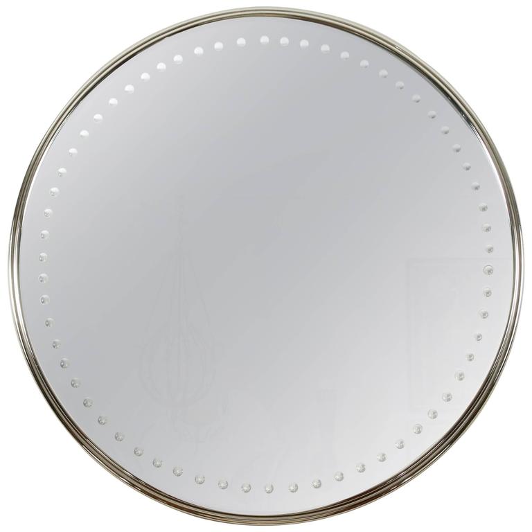 Impressively Scaled Round Mirror with Antique Silver Finish For Sale at
