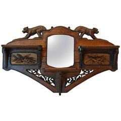 Antique Carved Oakwood Wall-Mounted Shaving Mirror with Flip-Up Shelves, circa 1890