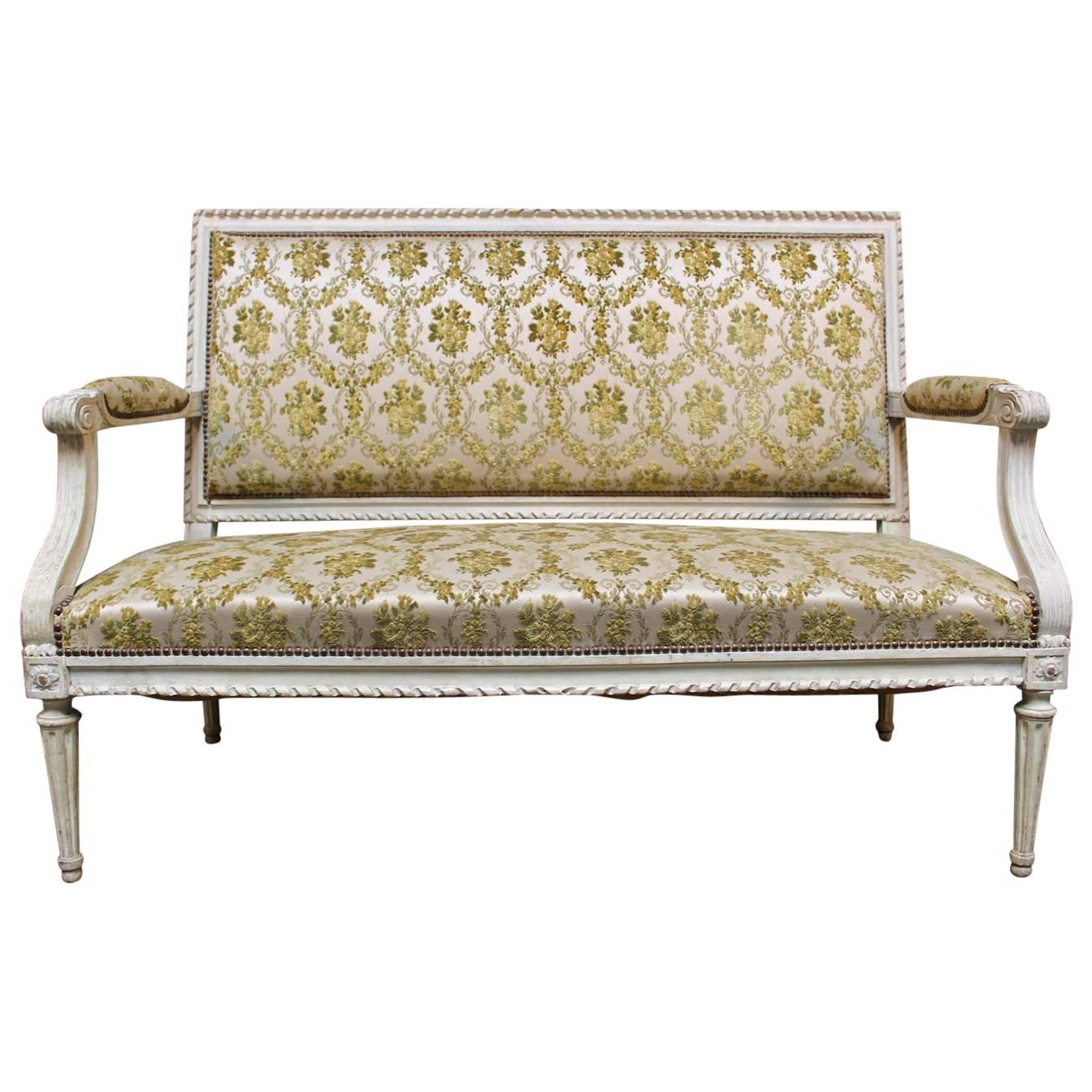 A French Louis XVI Settee with a Painted Finish