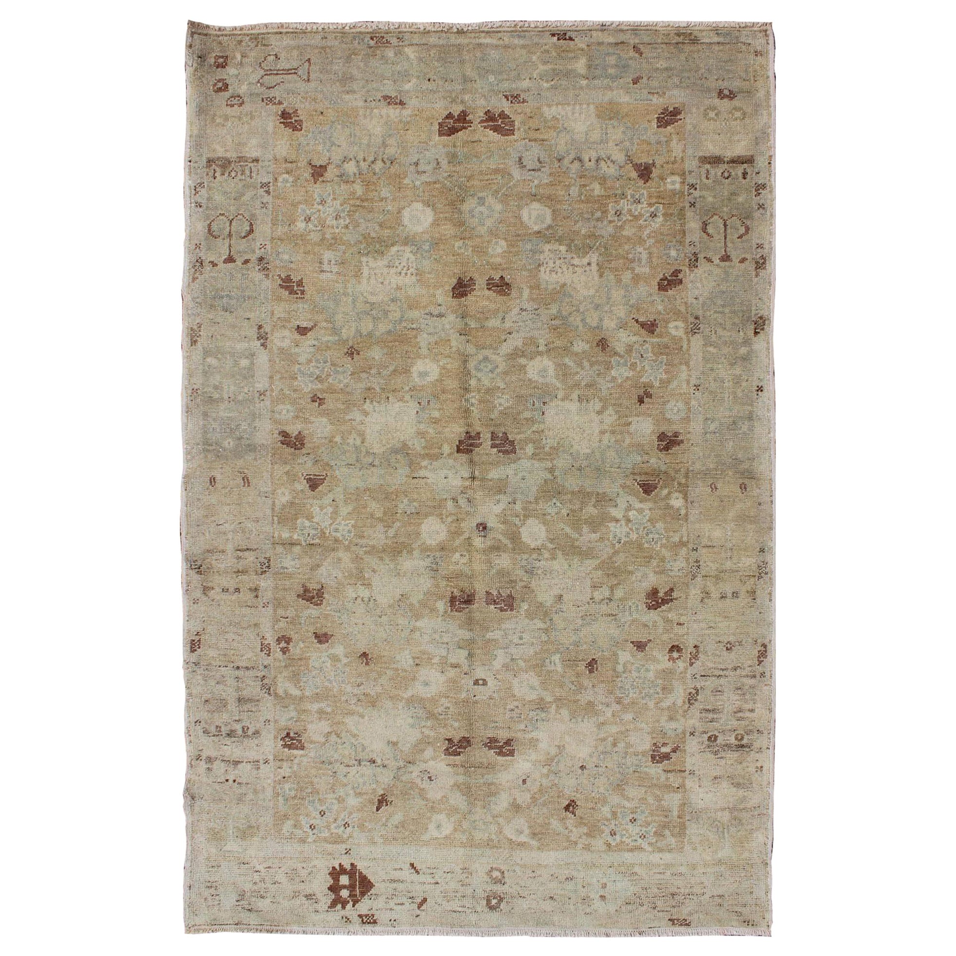 Turkish Vintage Hand Knotted Oushak Rug with All-Over Floral Design For Sale