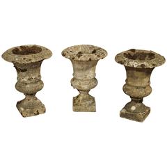 Antique Set of Three Small Reconstituted Stone Urns from France, circa 1900