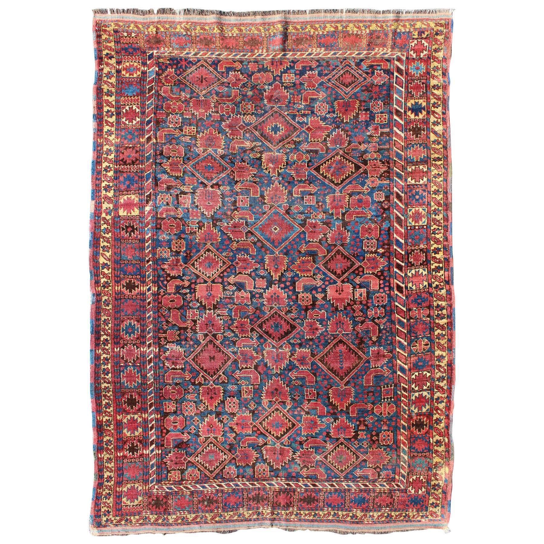 Mid 19th Century  Antique Beshir Rug from Turkmenistan in Blue, Red, Brown 