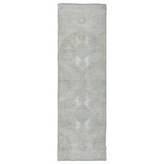 Muted Vintage Oushak Runner with Ornate Medallions and Greek Key Symbols