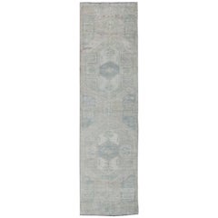 Muted Vintage Oushak Runner with Taupe and Light Blue Medallions