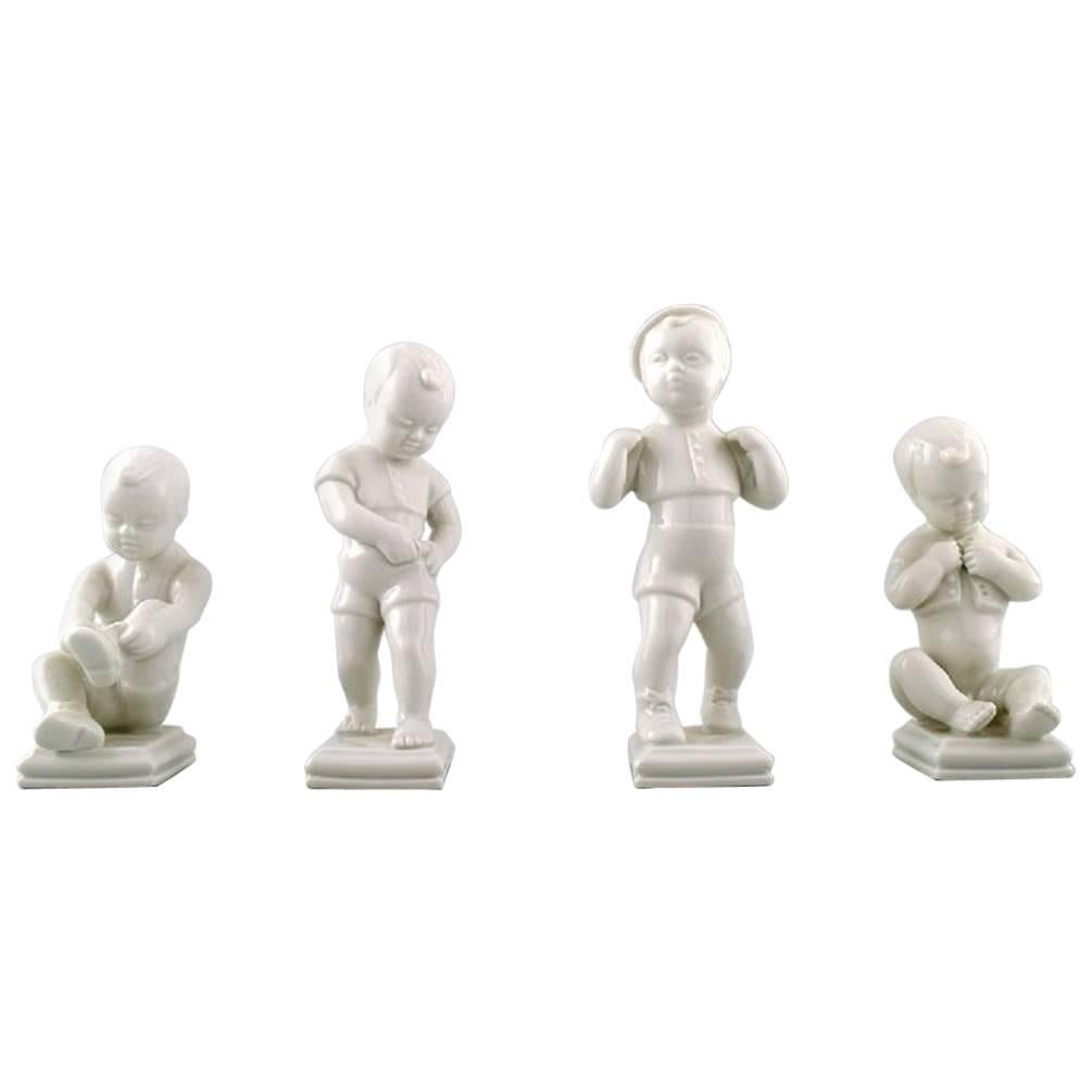 Edit Bjurström for Rörstrand, Sweden, Four Boy Figures, Blanc De Chine For Sale