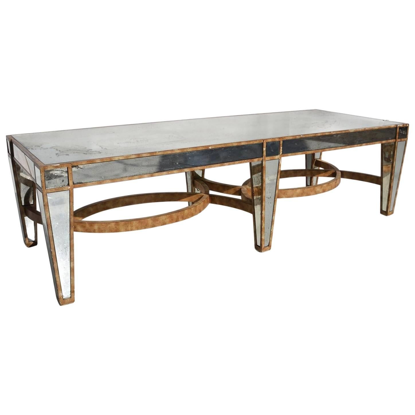 Hollywood Regency Coffee Table in Antiqued Mirror For Sale