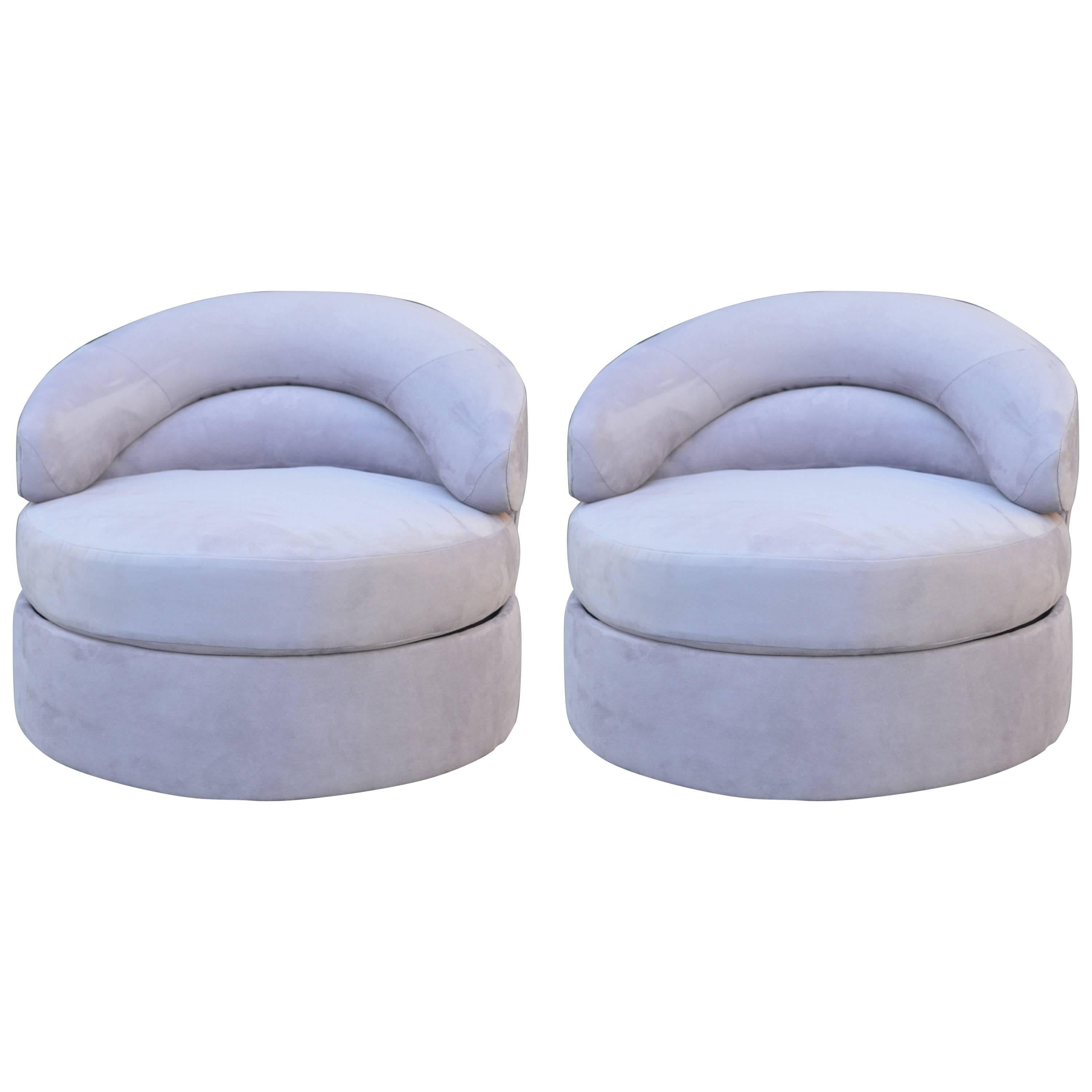 Pair of Directional Suede Swivel Chairs