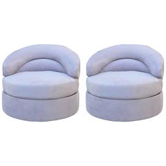 Pair of Directional Suede Swivel Chairs