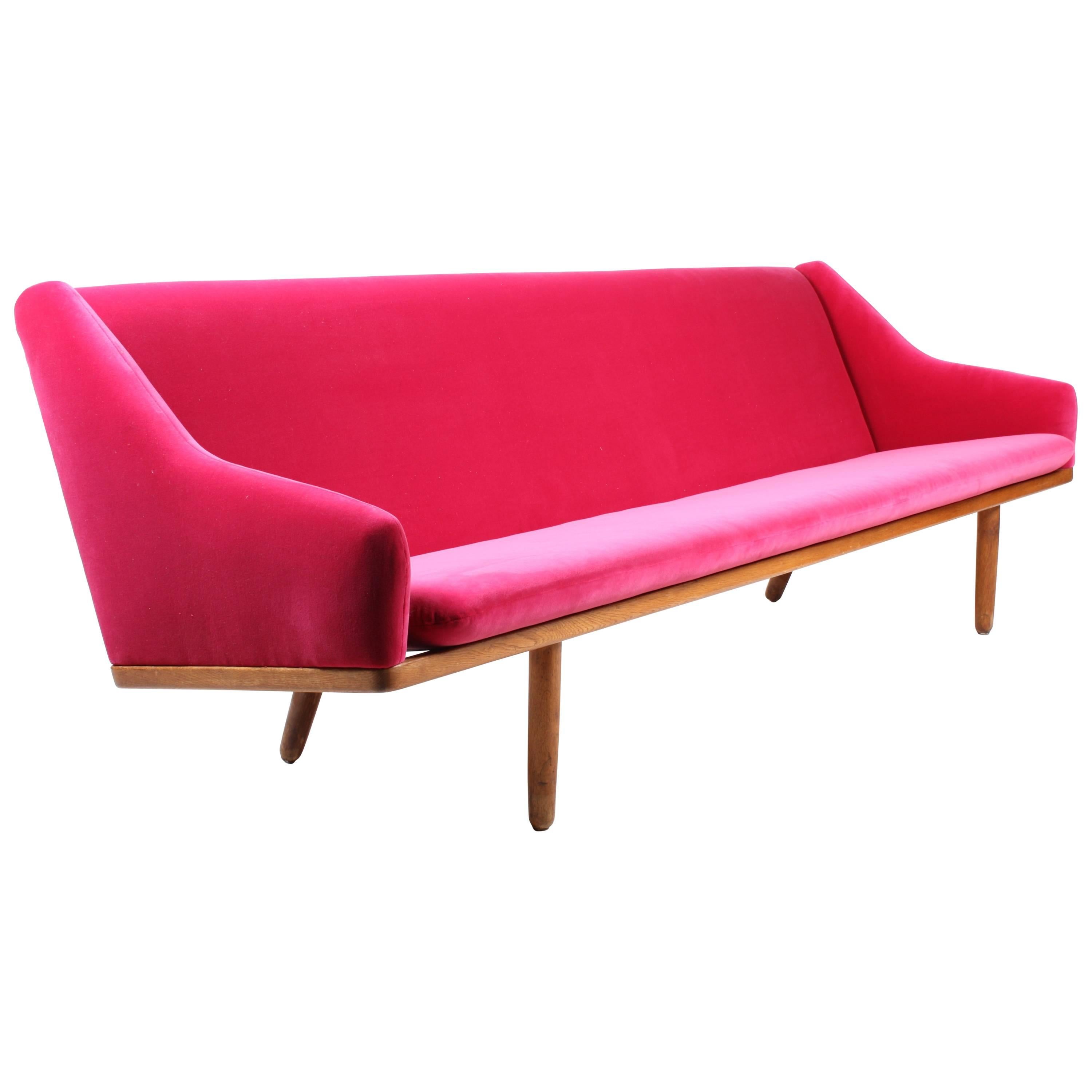 Elegant Four-Seat Fuchsia Velvet Sofa