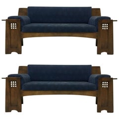 Two Architectural Oak Settees or sofas in the Style of Charles Rennie Mackintosh