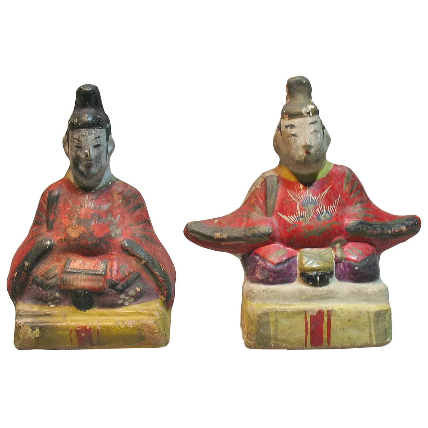 Deux rares poupées japonaises Izumo en argile de l'empereur et du Tenjin, période Meiji