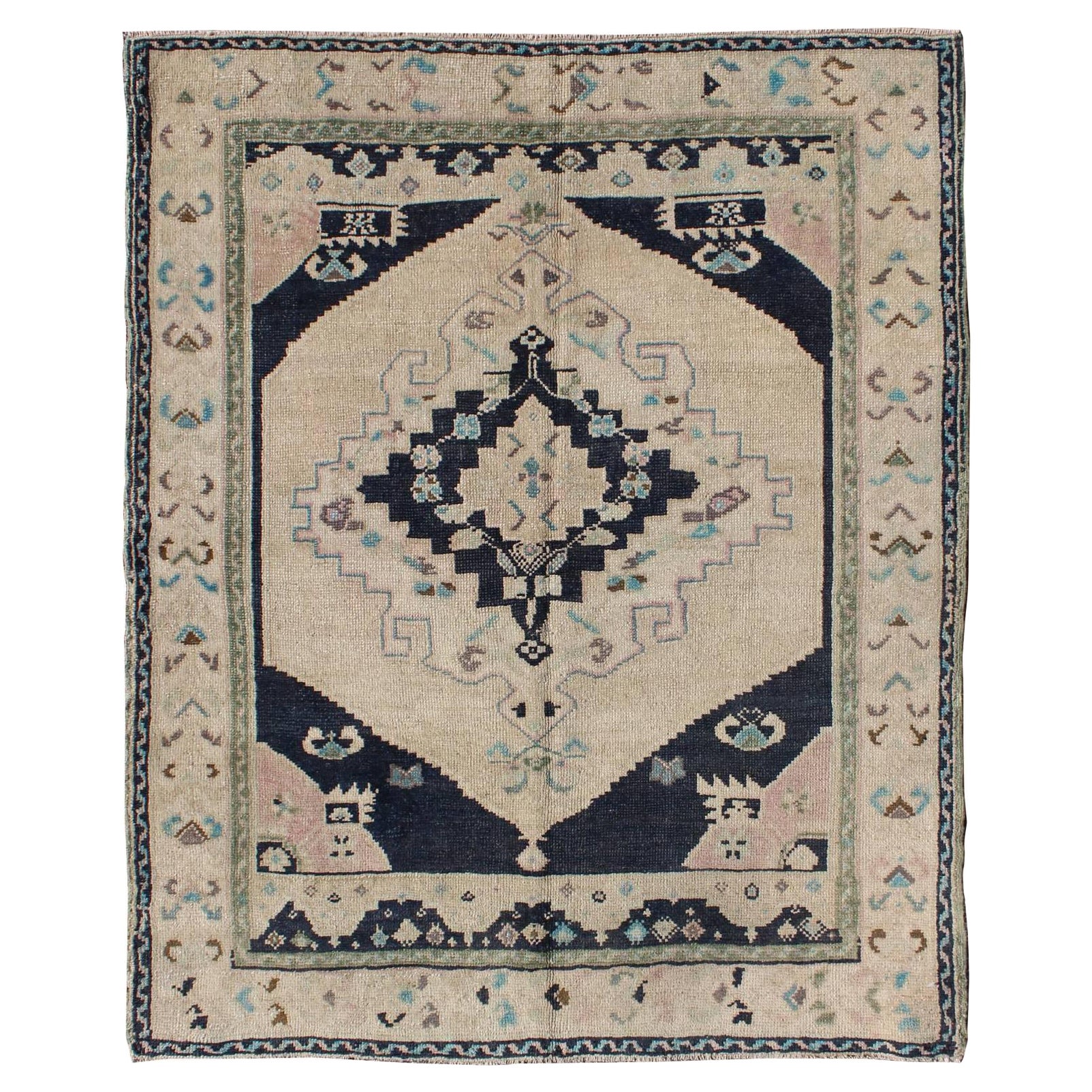 Vintage Hand Knotted Turkish Oushak Rug with Central Medallion in Cream and Blue For Sale