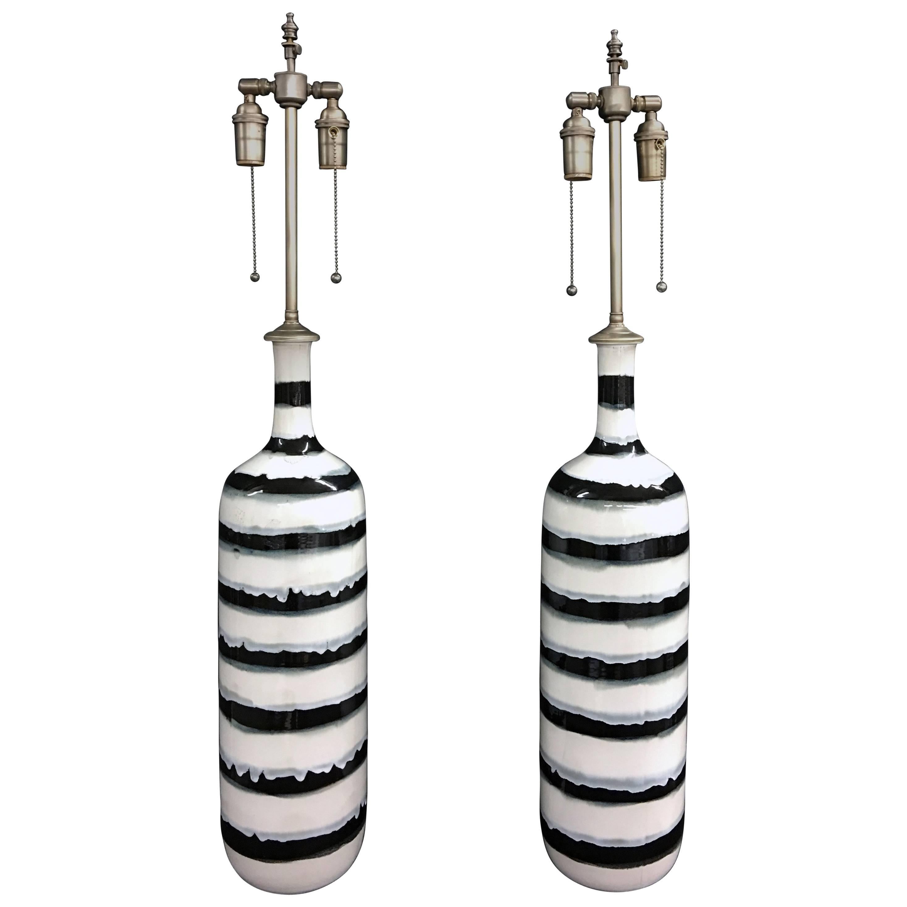 Unique Pair of Tall Hand-Painted and Glazed Vessels with Lamp Application