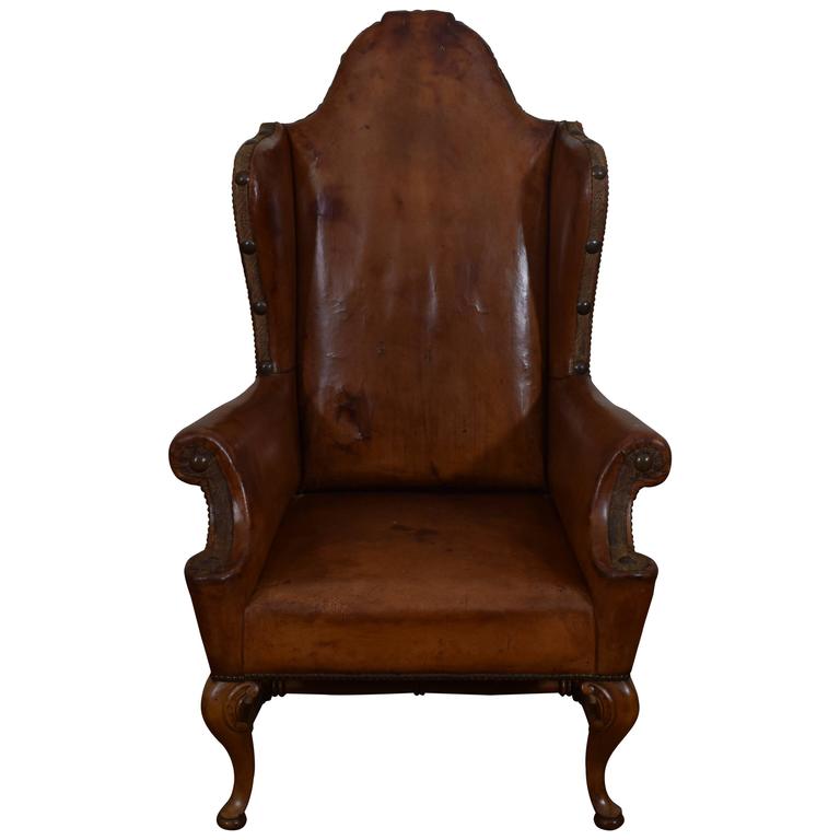 Spanish Baroque Style Walnut and Leather Upholstered Wing Chair, 19th