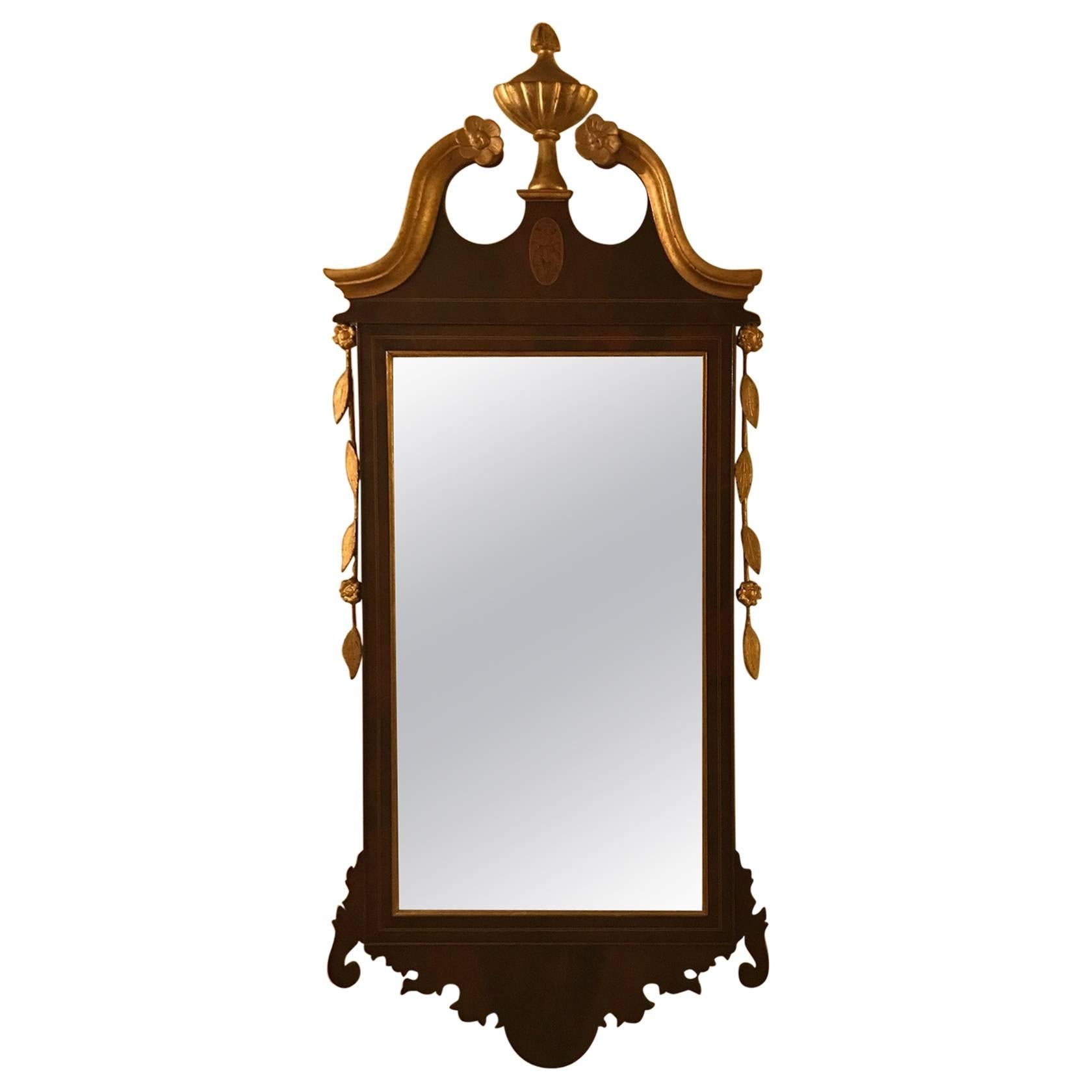 Diminutif miroir marqueté en acajou et doré 19ème siècle