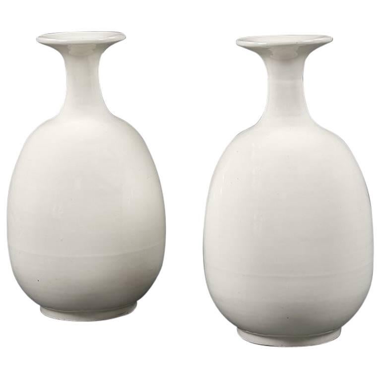 Pair of White Bulbous Baluster Vases