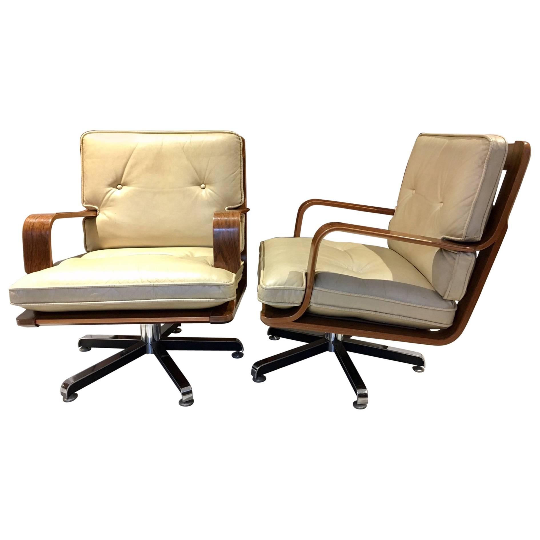 Pair of CreamColored Leather Swivel Armchairs with Wooden Frame at