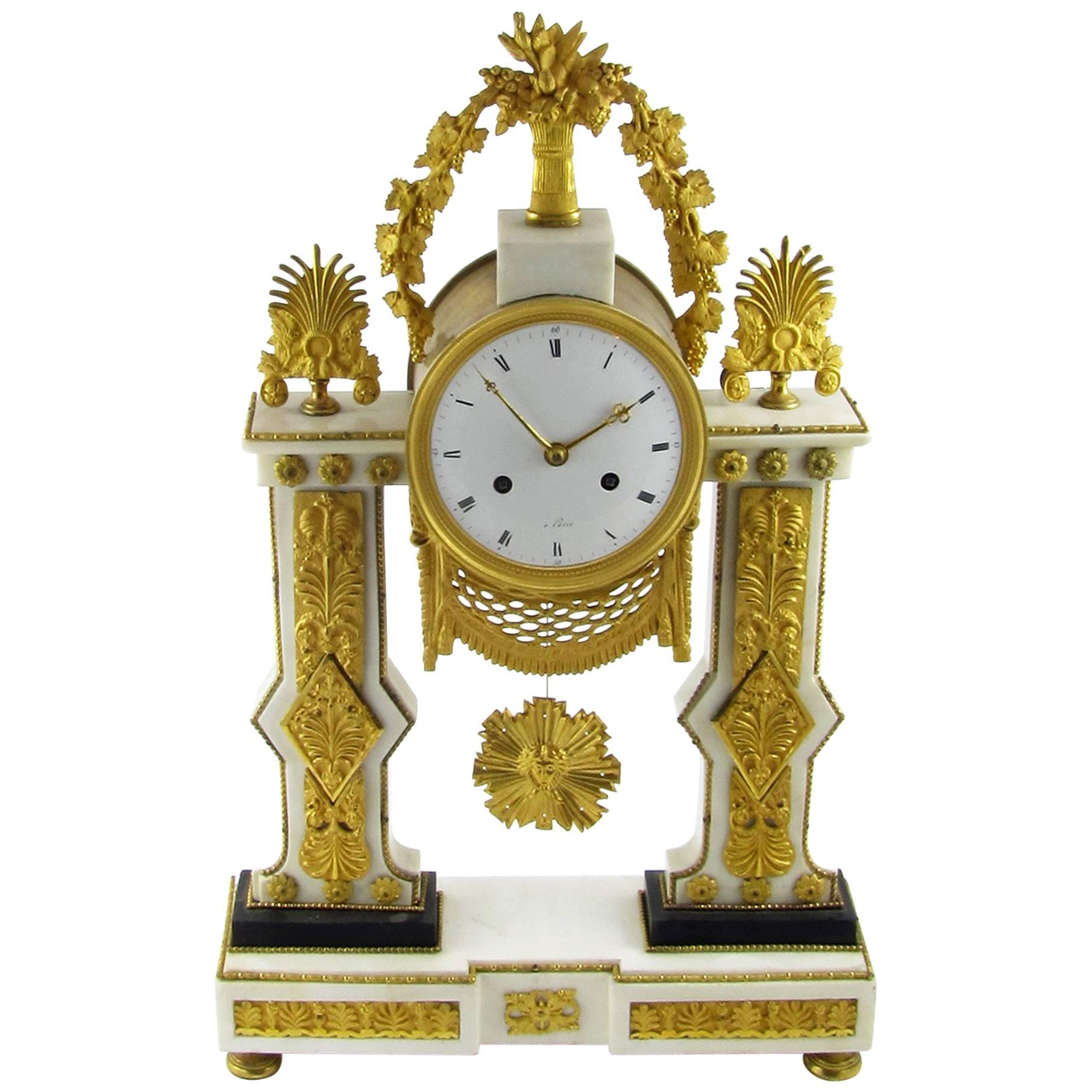 Late-18th Century French Louis XVI White Marble and Ormolu Gilt Mantel Clock For Sale