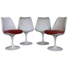 Four Eero Saarinen Tulip Swivel Chairs, First Edition