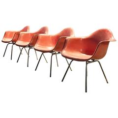 Set of four Eames Salmon Zenith Arm Shell Chairs Herman Miller