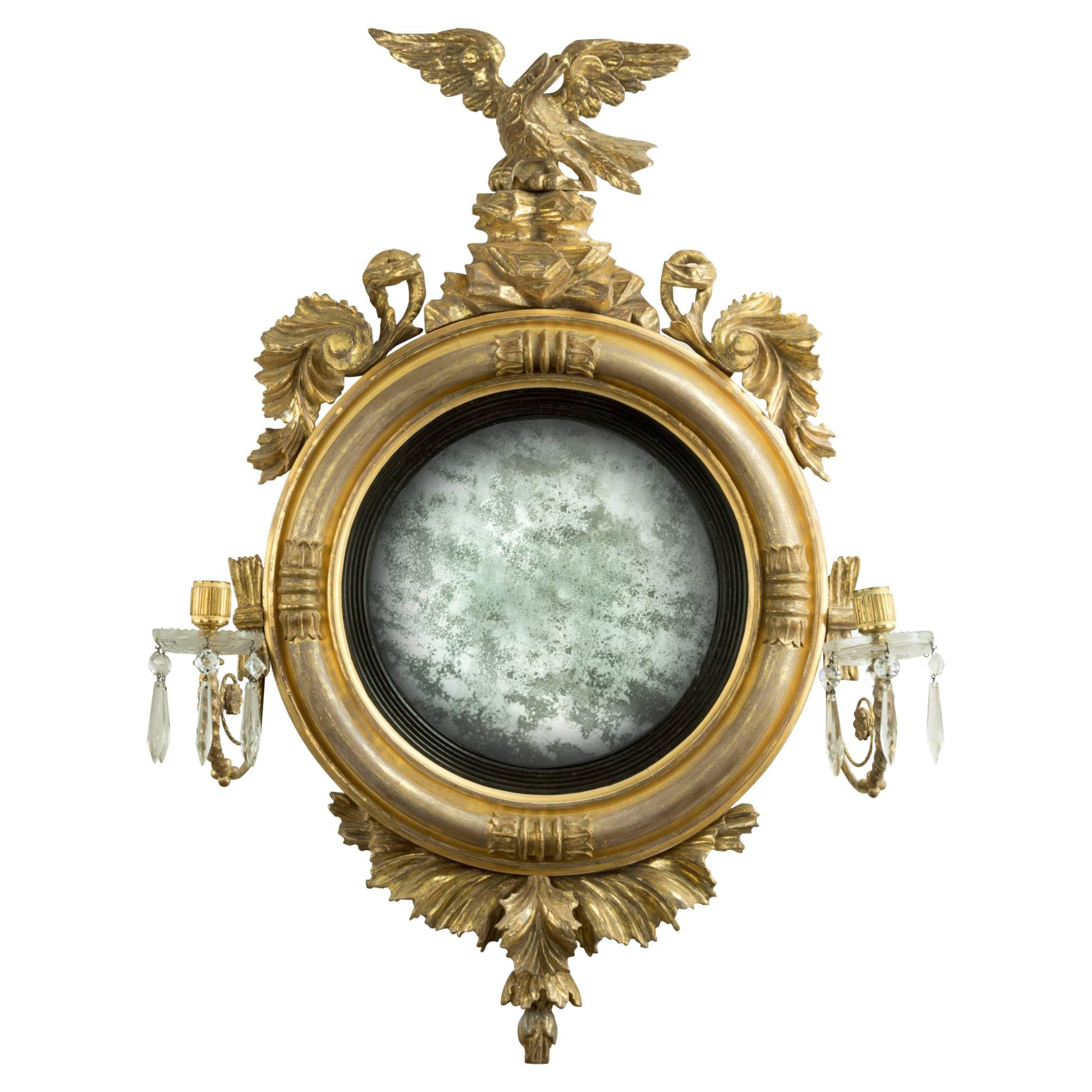 Regency Convex Mirror in Carved Giltwood For Sale