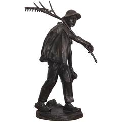 Bronze of a Farmer Returning Home by Hans Muller