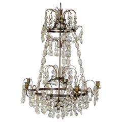 Six Branch Patinated Brass and Glass Chandelier