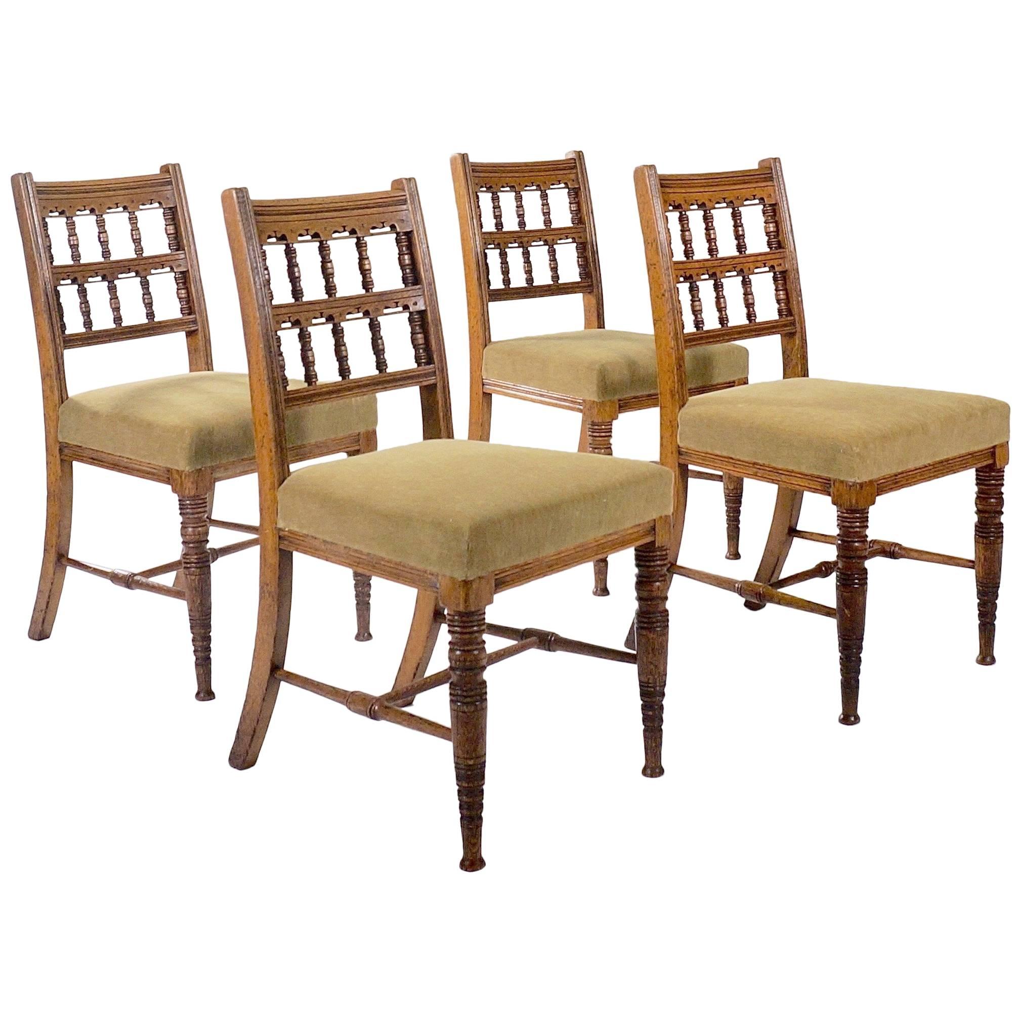 Set of Four Carved Oak Side Chairs by Bruce Talbert