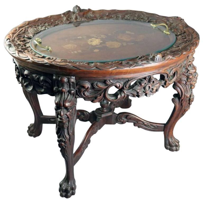 Antique Carved and Inlaid Figural Tea Table with Lion, Cherubs, Paw Feet