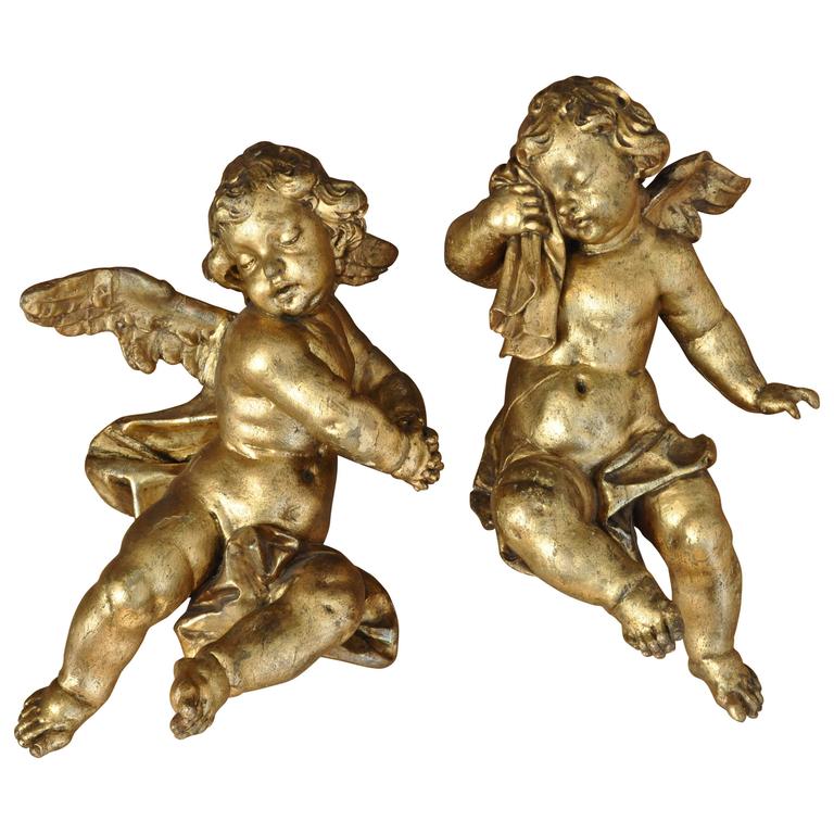 Pair of Italian Baroque Carved and Giltwood Cupids For Sale at 1stdibs