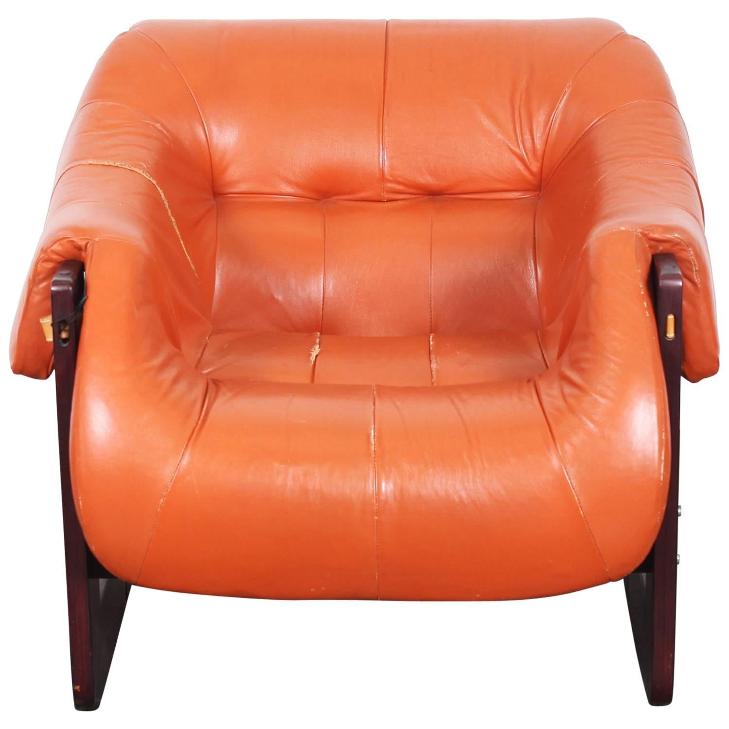 Mid-Century Modern lounge chair by Percival Lafer with Brazilian rosewood and original vintage leather. Really unique design and construction make this a true statement piece. Matching sofa and additional lounge chair with ottoman is available.